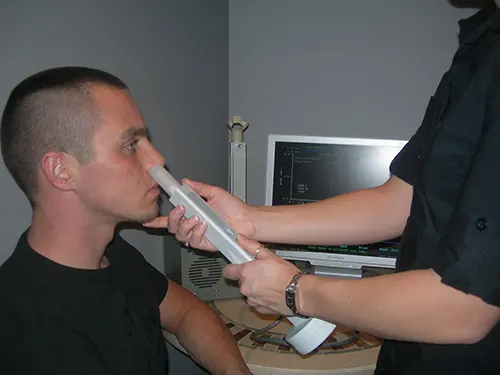 rhinometer being used on a man